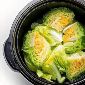 Put raw cabbage wedges in a slow cooker with these