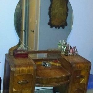 Instead of throwing a 1942 vanity table away