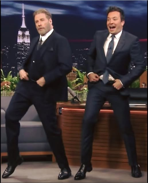 John Travolta performs iconic moves we all from