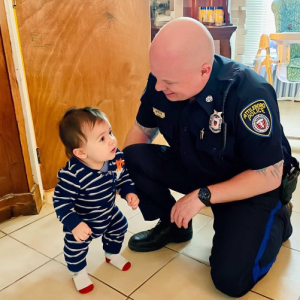 The Officer Knelt and Asked, “Where’s Your Mom