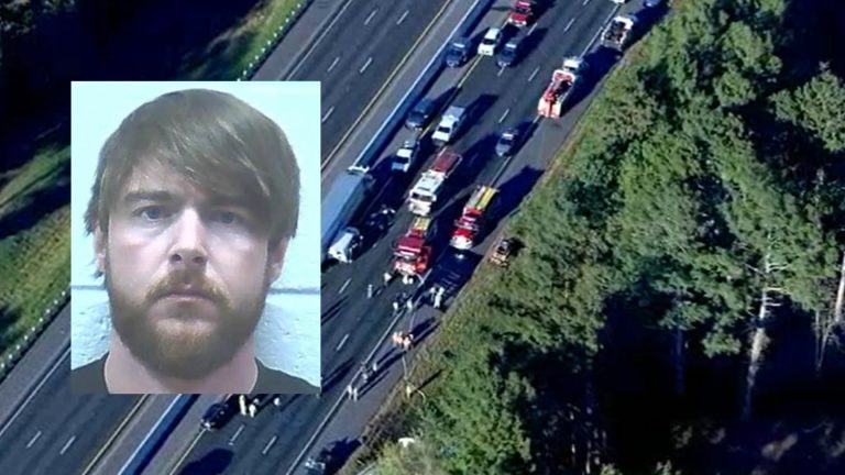 Truck driver charged in deaths of 8 family