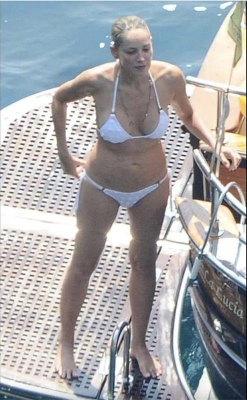 Sharon Stone rocks bikini at 66