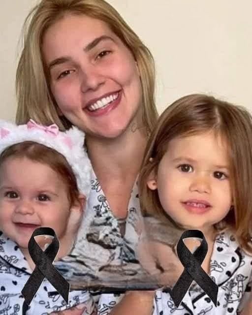 Young woman puts both daughters inside